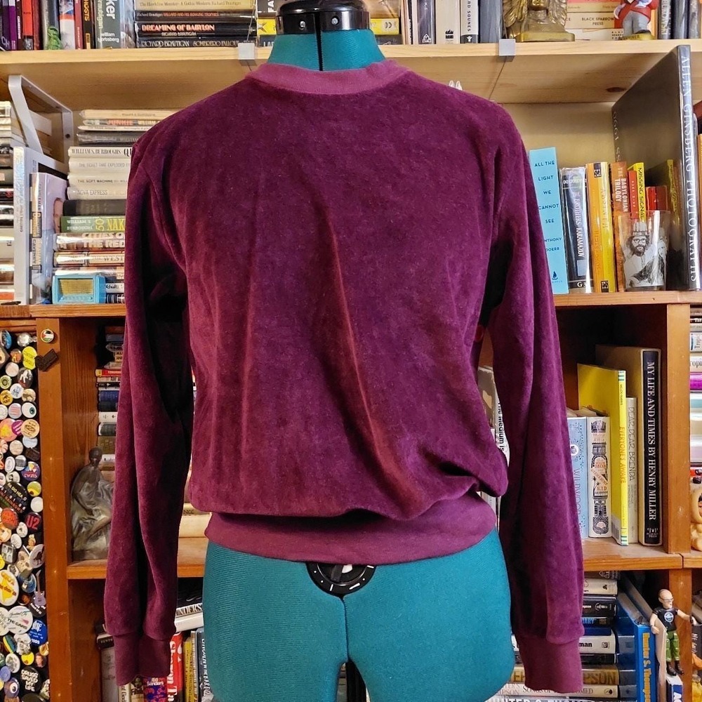Vintage purple velvet sweatshirt with one sided button detail.